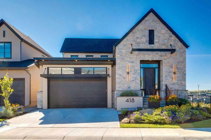 A polished modern stone home ready for market